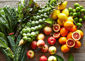a group of fruits and vegetables on a wood surface Healthy Weight Loss Diets Barrow